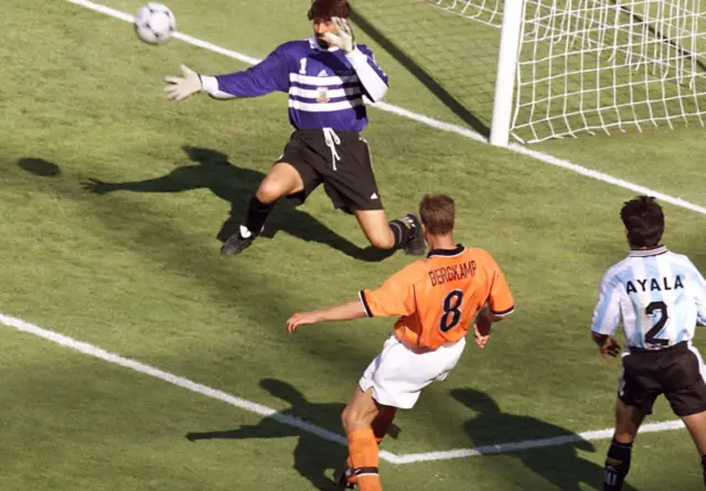 Dennis Bergkamp scores against Argentina