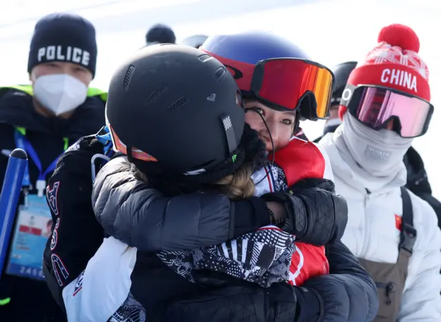 Eileen Gu hugs Chloe Kim