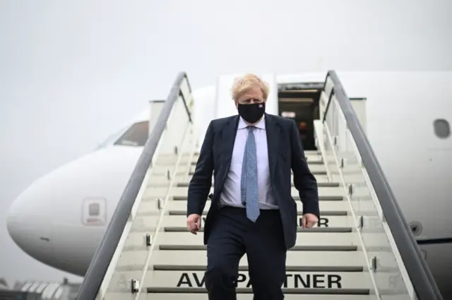 Boris Johnson arrives by plane in Brussels