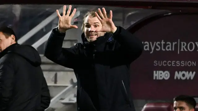 How many points clear are Hearts in third place?