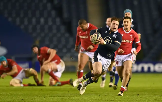 Stuart Hogg runs with the ball during Scotland's win in Llanelli in 2020