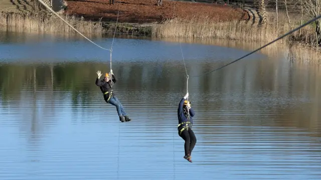 Sir Robert Goodwill MP and Lord Downe on the zip-line