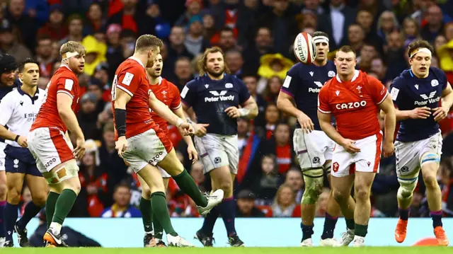 Dan Biggar scores a drop-goal for Wales