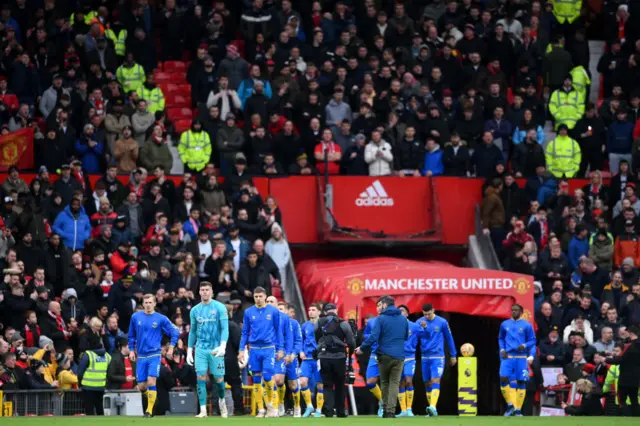 Southampton emerge from the Old Trafford tunnel ahead of their game against Manchester United