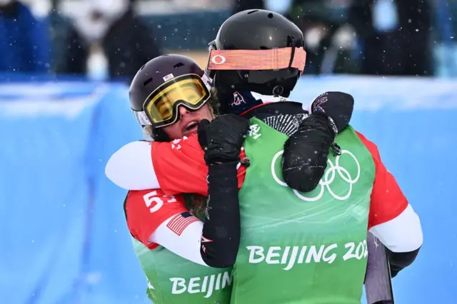 Lindsey Jacobellis hugs Nick Baumgartner