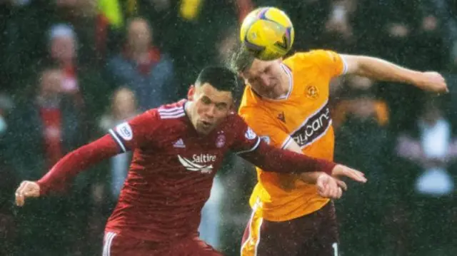 Motherwell and Aberdeen are competing in heavy rain at Fir Park