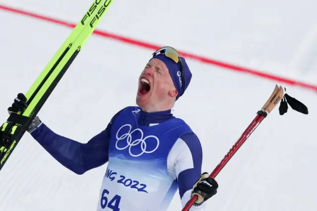 Cross country skiier celebrates