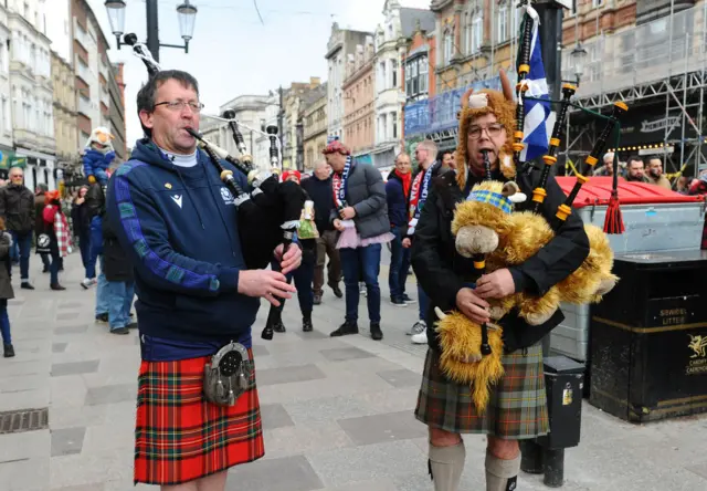 Scotland fans playing bagpipes in Cardiff