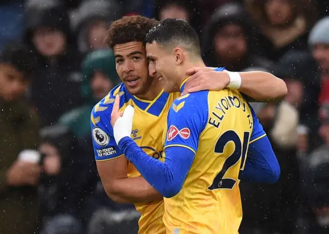 Che Adams celebrates