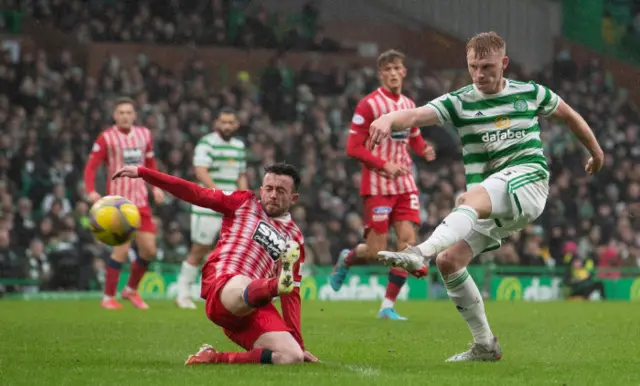 Celtic's Liam Scales scores