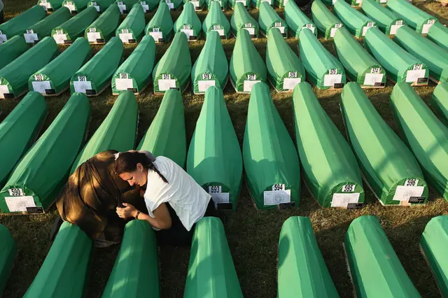 Women mourners at mass burial site in Srebrenica