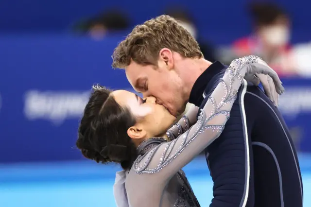 Skaters kiss at Winter Olympics