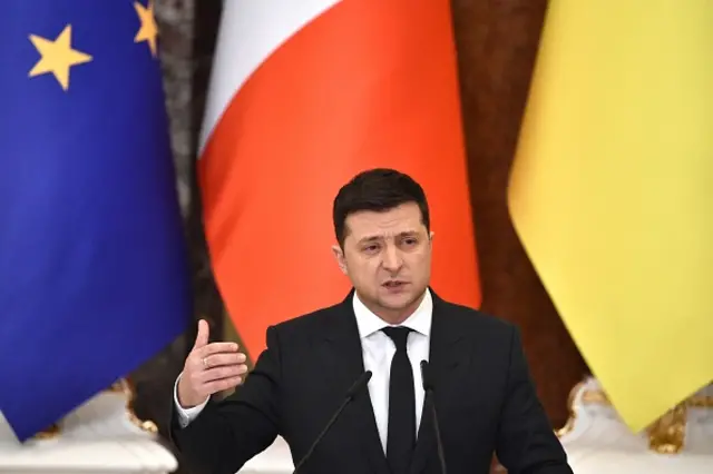 President Zelensky speaking to the press