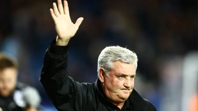 Steve Bruce waves