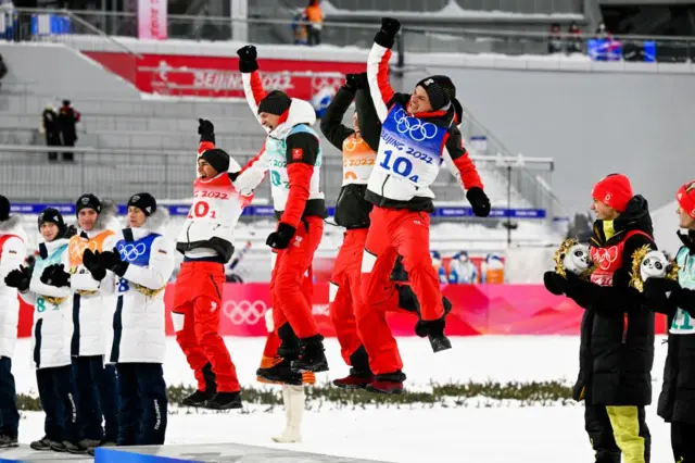 Austria celebrating their gold medal on the podium