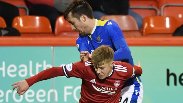 Aberdeen's Connor Barron holds off St Johnstone's Callum Booth