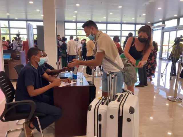 Passengers arrive at Zanzibar's main airport