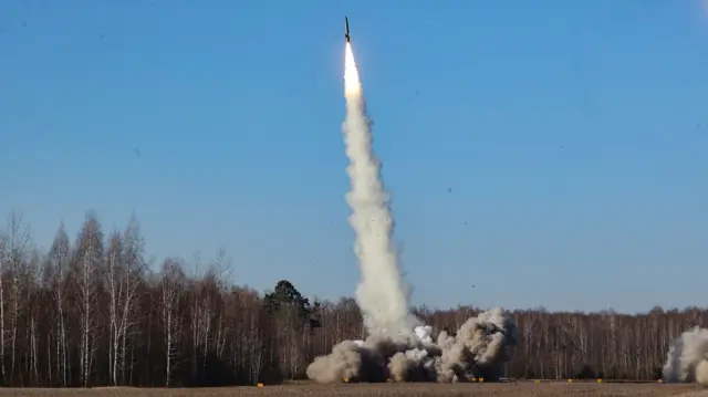 A handout photo made available by Belta news agency shows a high-precision missile system Tochka-U launches a missile during the joint operational exercise of the armed forces of Belarus and Russia.