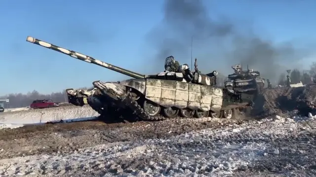 Military vehicles are seen as some military units begin to return to their bases after completing their missions within military drill in Russia on February 15, 2022.