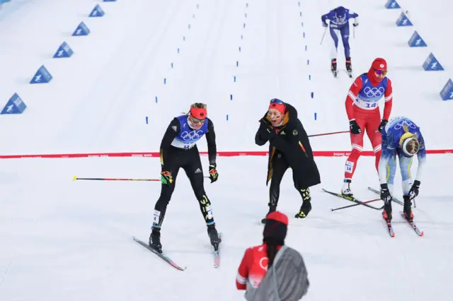 German team react at line after winning womens team sprint