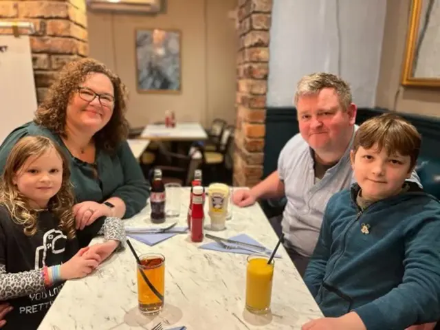 Vida (top left), her husband Richard, (top right), daughter Rina and son Louis