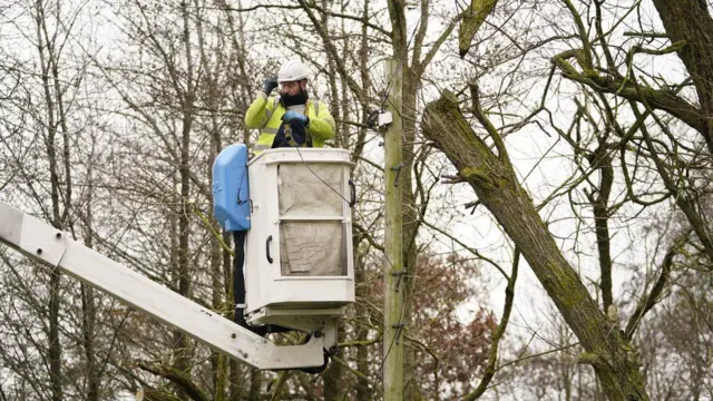 Engineer checking cables