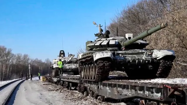 A photo by the Russian defence ministry purportedly showing military equipment being moved by rail