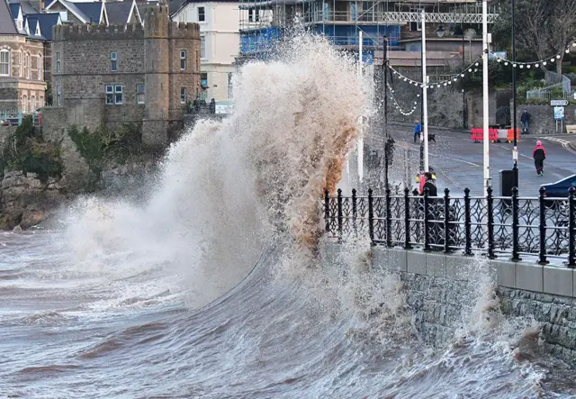 Waves batter sea walls at Clevedon, North Somerset