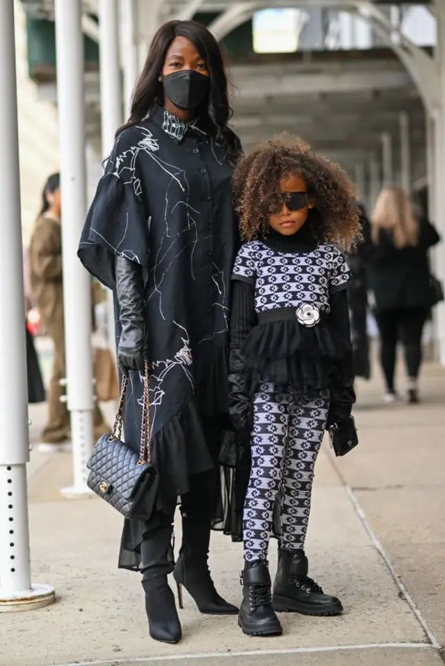 Seven-year-old influencer Aria De Chicchis poses with her mother and manager, South African-born Pam Mbatani, on Saturday during New York fashion week.