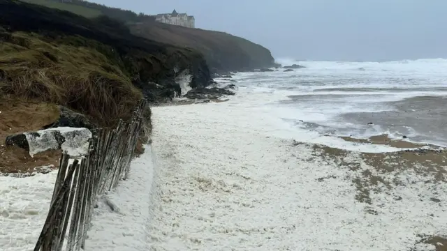 Sea foam at Poldhu Beach Cafe