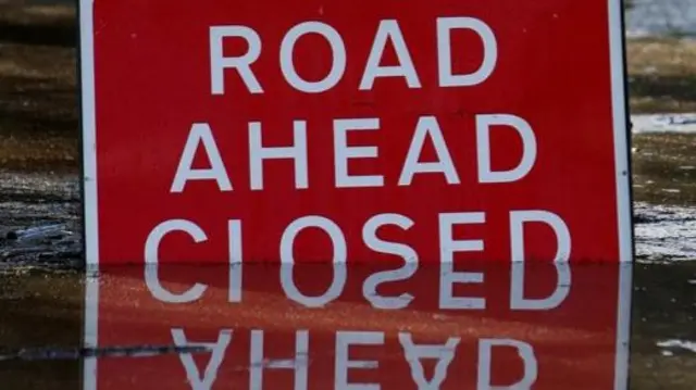 Road closed sign