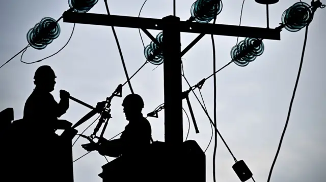 Engineers on power line