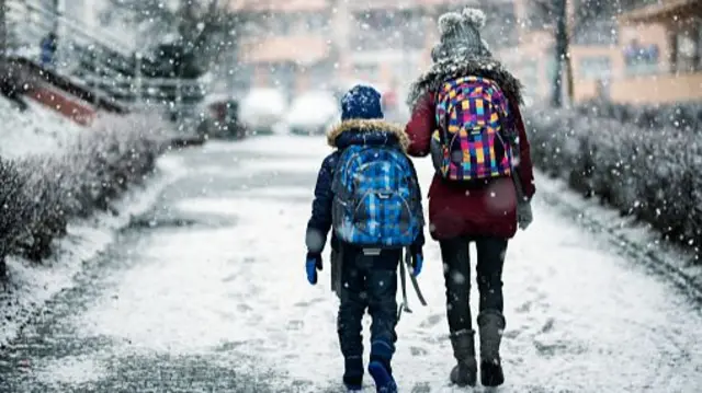 Schoolchildren in the snow