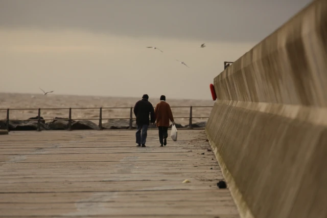 People walking at Ness Point, Lowestoft