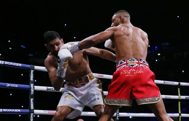 Kell Brook punches Amir Khan