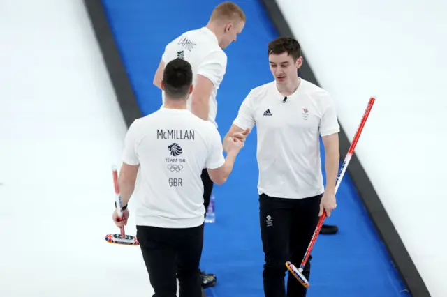 Hardie shakes hands with lammie