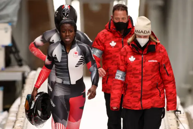 Team canada walking after crash