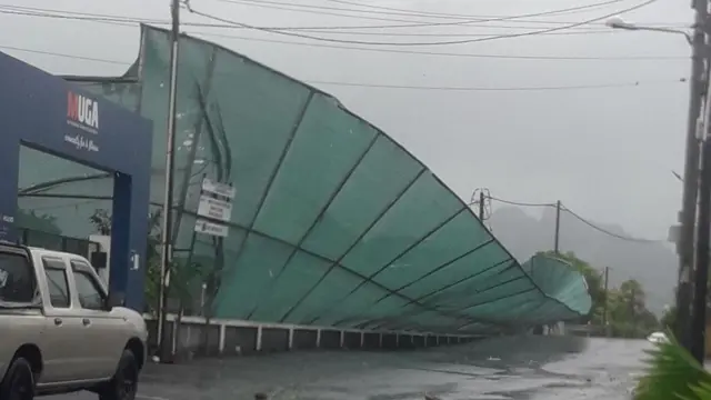 A car driving in Mauritius amid gusting winds