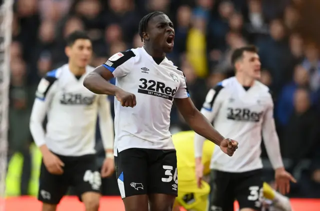 Festy Ebosele of Derby County celebrates his teams second goal during the Sky Bet Championship match between Derby County and Birmingham City at Pride Park Stadium on January 30, 2022