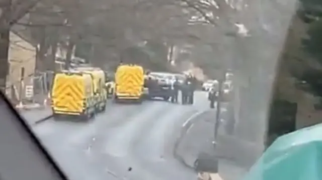 Police vehicles at property in Greengates