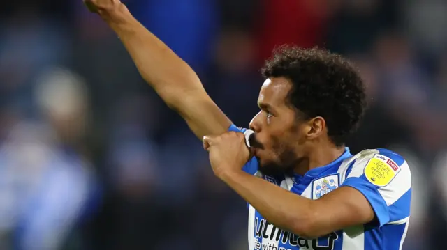 Duane Holmes celebrates