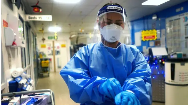 A nurse in PPE