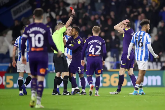 Richard Stearman sent off.