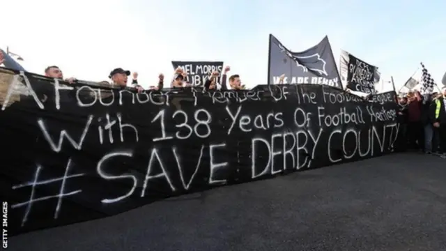 Derby fans protest.