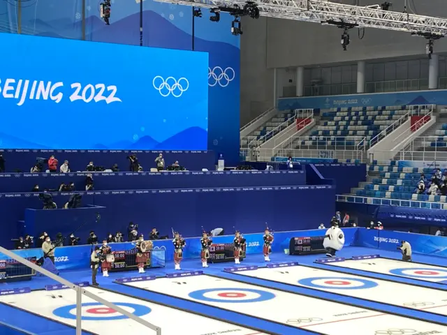 Bagpipers at the curling