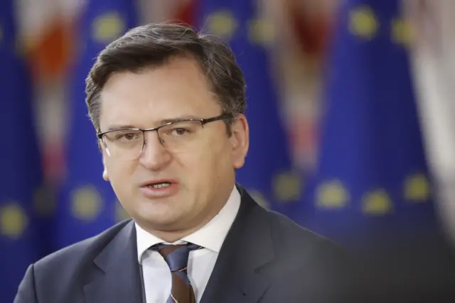 Ukraine's Foreign Minister Dmytro Kuleba speaks to the press as he arrives for the EU Foreign Affairs Council meeting in Brussels, Belgium, 21 February 2022.