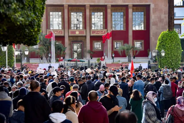 Moroccans gather in front of the parliament in the capital Rabat to protest against rising prices, on February 20, 2022.