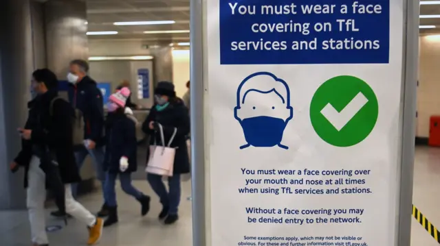 Mask sign on the tube