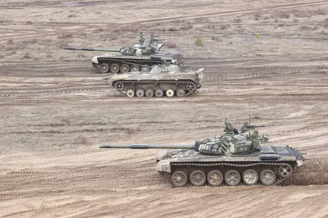 Russian tanks taking part in military exercises