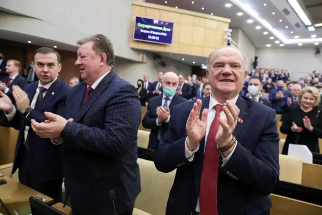 Russian lawmakers applaud in Duma